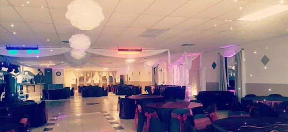View of Diana's event hall with tables set and lighting